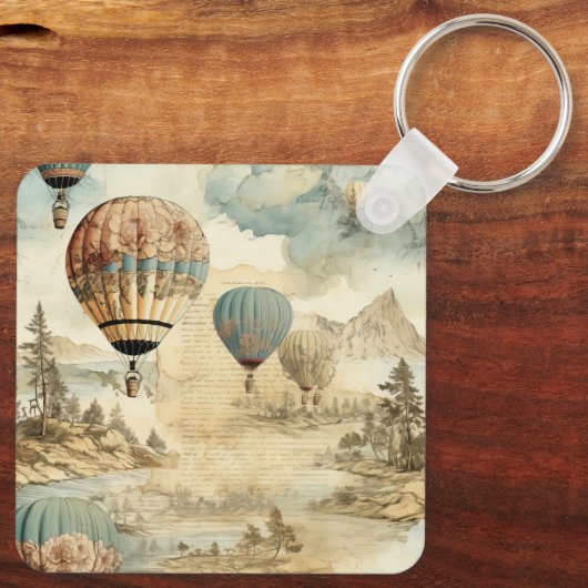 heteluchtballon in een sereen landschap (7) sleutelhanger (Achterkant)