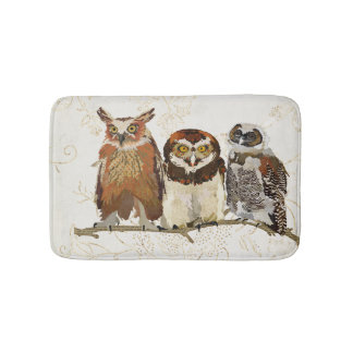 Hiboux dans un tapis de bain de rangée