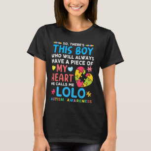 Hier is een jongen die hij me Lolo Autism Awarenes T-shirt