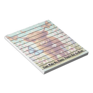 Highland Koe met vlinders en voorjaarsbloemen Notitieblok