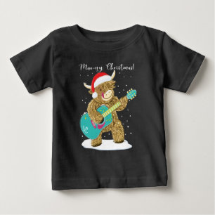 Highland Koe speelt een prettige kerstmelodie Baby