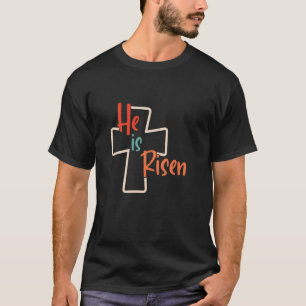 Hij Is Opgestaan Heilige Kruis God Geloof Jezus T-shirt