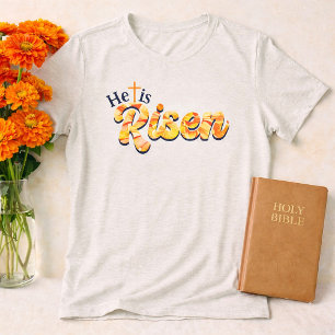 Hij Is Opgestaan Kruis Oranje Bloem Lettering Pase Tri-Blend Shirt