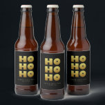 Ho Ho Ho | Simple Christmas Black & Gold Beer Bot<br><div class="desc">Étiquette simple bouteille de bière noir & or de Noël avec texte "Ho Ho Ho" dans un style amusant mais élégant typographie. Customisez avec un bref message d'accueil et le nom de l'expéditeur. Mélanger et correspondre avec d'autres modèles de cette série.</div>