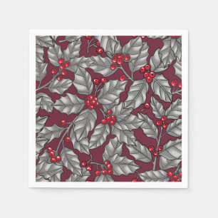 Holly berry, grijze bladeren op donkerrood servet