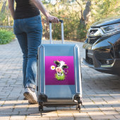 Holstein cow in grass over purple sticker (Koffer Insitu)