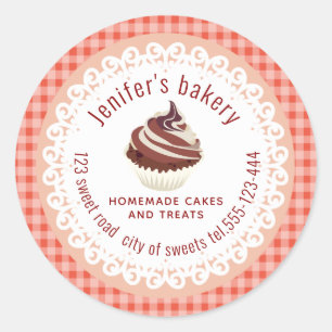 Homemade cupcakes en tappen met een gepoetseerd po ronde sticker