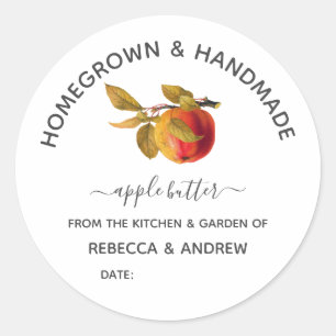 Homemade en met de hand gemaakte appelboter in een ronde sticker