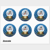 Homme de neige dans un autocollant de globe de (Feuille)