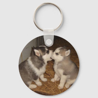 hond die een hond bijt sleutelhanger