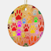 Hondenpootafdrukken op achtergrond keramisch ornament (Links)