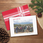 Horizontale foto met kerstscript, roodvlecht feestdagenkaart