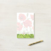 Horizontale grens met rode papaver post-it® notes (Op bureau)