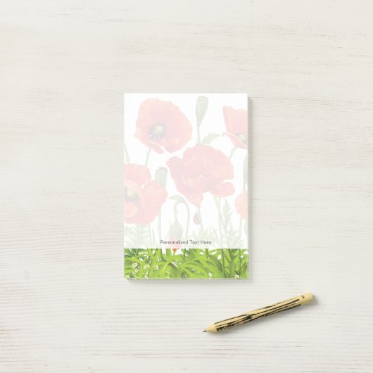 Horizontale grens met rode papaver post-it® notes (Op bureau)