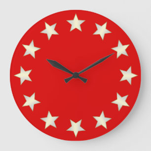 Horloge à étoiles blanches sur fond rouge