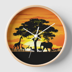 Horloge Animaux sauvages sur le coucher de soleil de la sa