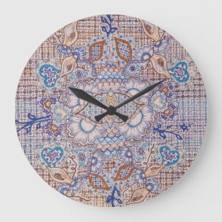 horloge avec la conception florale bleue et brune