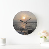Horloge avec le coucher du soleil (Maison)