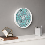 Horloge Bohemian Aqua Turquoise Ikat Motif d'art tribal<br><div class="desc">Beau aqua bleu turquoise, gris & turquoise bleu-vert bleu-vert couleur orientale Ikat motif design. Décor intérieur décoratif, élégant et branché, accents & accessoires pour décorateur intérieur artistique, la diva de mode artsy, le populaire trendsetter, vintage mod retro, moderniste, style Art nouveau déco ou amoureux abstrait de motifs géométriques. Décor original...</div>