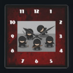 Horloge Carrée 5 Petites ninjas posant avec des armes<br><div class="desc">5 mignons petits ninjas dans diverses positions et tenant une variété d'armes,  y compris un poignard,  quelques nunchucks,  et lancer des étoiles. Portant une tenue traditionnelle noire en ninja et ayant l'air plus mignon que épouvantable. L'arrière - plan est une texture abstraite rouge sang.</div>