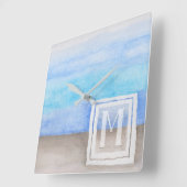 Horloge Carrée Aquarelle Monogramme mer et sable bleu et bronze (Angle)