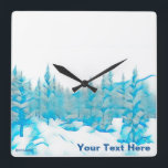 Horloge Carrée Arbres bleus neigeux<br><div class="desc">Image monotone bleue stylisée de conifères recouverts de neige. Ajoutez votre propre texte.</div>