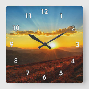 Horloge Carrée Beau coucher de soleil sur les montagnes