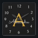 Horloge Carrée Black Gold Script Monogram Girly<br><div class="desc">Gold and Black Script Monogram Clock This makes the perfect sweet 16 birthday,  wedding,  bridal shower,  anniversary,  baby shower or bachelorette party gift for someone that loves glam luxury and chic styles.</div>