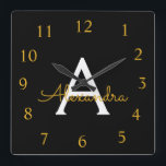 Horloge Carrée Black Gold Script Monogram Girly<br><div class="desc">Gold and Black Script Monogram Clock This makes the perfect sweet 16 birthday,  wedding,  bridal shower,  anniversary,  baby shower or bachelorette party gift for someone that loves glam luxury and chic styles.</div>