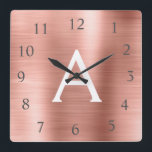 Horloge Carrée Blush Pink - Rose Gold Metallic Monogram Nom<br><div class="desc">Blush Pink - Rose Gold Faux Stainless Steel Foil Monogram Name and Initial Custom Unique Wall Clock for the House or Office. The Wall Clock makes the perfect Christmas or Sweet 16,  18th,  21st,  30th,  40th,  50th ou 60th Birthday vend for someone who loves pink métallc decor.</div>