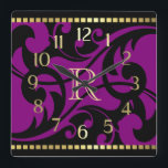 Horloge Carrée Bordure or avec monogramme<br><div class="desc">Purple Flourish Design Gold Bordure avec Monogrammes Designs par Umua. Imprimé et expédié par Zazzle ou ses partenaires.</div>