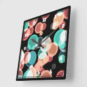 Horloge Carrée Bubbles multicolores sur un fond noir (Angle)