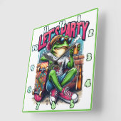 Horloge Carrée Célébration avec une grenouille cool sur un skateb (Angle)