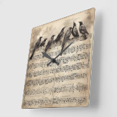 Horloge Carrée chant d'oiseaux assis sur une composition musicale (Angle)