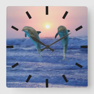 Horloge Carrée Dauphin de Bottlenose au lever de soleil