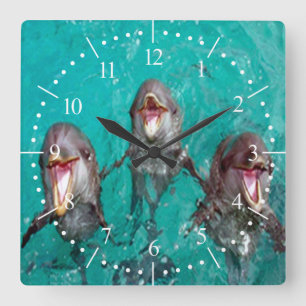 Horloge Carrée Dauphins de chant dans l'océan