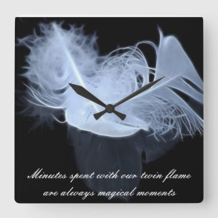 Horloge Carrée Deux plumes de flamme et réflexion