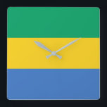 Horloge Carrée Drapeau Gabon<br><div class="desc">Le drapeau gabonais est un tribande horizontal. Les couleurs utilisées dans le drapeau sont le bleu,  le vert,  le jaune. La proportion du drapeau gabonais est de 3:4. Le drapeau du Gabon a été adopté en 1960.</div>