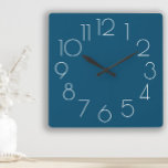 Horloge Carrée Editable Modern Minimalist Navy Blue White Clock<br><div class="desc">Add your own text ( or leave it the way is ) to this minimalist navy blue white wall clock. Background color is completely customizable using Zazzle's design tool.</div>