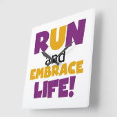 Horloge Carrée Exécuter Embrasser la vie violet jaune (Angle)