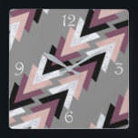 Horloge Carrée Faux rose white marble purple geometri<br><div class="desc">Modern and trendy design featuring faux rose gold,  white marble,  purple and black triangles on a grey background.</div>
