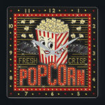 Horloge Carrée Film Theatre Marquee Home Cinéma Popcorn<br><div class="desc">Profitez d'une soirée cinéma familiale dans le style avec cette horloge murale de théâtre originale qui a un thème pop-corn. Fabriqué pour ressembler à un chapiteau de cinéma rétro avec des faux lumières et beaucoup de scintillement, ce design personnalisé est l'accessoire idéal pour tout cinéphile. Les couleurs principales sont le...</div>