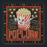 Horloge Carrée Film Theatre Marquee Home Cinéma Popcorn<br><div class="desc">Profitez d'une soirée cinéma familiale dans le style avec cette horloge murale de théâtre originale qui a un thème pop-corn. Fabriqué pour ressembler à un chapiteau de cinéma rétro avec des faux lumières et beaucoup de scintillement, ce design personnalisé est l'accessoire idéal pour tout cinéphile. Les couleurs principales sont le...</div>