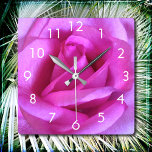 Horloge Carrée Fleur rose rose photo moderne design simple audaci<br><div class="desc">Une photo de fond d'une rose violet-rose vif donne envie de "s'arrêter et sentir les fleurs". Détendez-vous et respirez la beauté de cette photographie chaque fois que vous regardez l'heure sur cette horloge murale impressionnante et graphique de photographie. Vous avez le choix entre un visage rond ou carré. Fait un...</div>
