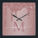 Horloge Carrée Girly Rose Gold Sparkle Glitter Drips monogram<br><div class="desc">Girly Rose Gold Sparkle Glitter Drips Monogram Wall Clock for your baby's room with fashion blush pink/rose gold glitter drips on a chic background with your custom monogram and name. This cute design is easy to customize for your baby or toddler's menace. Please contact us at cedarandstring@gmail.com if you need...</div>