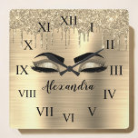 Horloge Carrée Gold Glitter Sparkle Eyelashes Monogram<br><div class="desc">Gold Faux Foil Metallic Sparkle Glitter Brushed Metal Monogram Name and Initial Eyelashes (Lashes),  Eyelash Extensions and Eyes cute wall clock. The design makes the perfect sweet 16 birthday,  wedding,  bridal shower,  anniversary,  baby shower or bachelorette party gift for someone looking for a trendy cool style.</div>