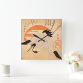 Horloge Carrée Grue blanche volant sur le disque du Soleil (Maison)