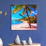 Horloge Carrée Hawaii Palm Tree Plage tropicale Regarder Vintage<br><div class="desc">Revenez à la mémoire des jours de plage tropicale et paresseux chaque fois que vous regardez ce rétro de vacances Hawaii, look vintage, horloge murale en détresse d'un palmier solitaire sur une plage de sable, croissant, avec ciel bleu turquoise clair et l'eau. Vous avez le choix entre un visage rond...</div>