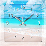Horloge Carrée Hawaii plage de sable tropical turquoise photo de<br><div class="desc">Rappelez-vous l'odeur de sel frais de l'air marin chaque fois que vous regardez l'heure sur cette magnifique horloge murale photo colorée vibrante. Découvrez et explorez la solitude d'une plage hawaïenne vide. Vous avez le choix entre un visage rond ou carré. Fait un grand cadeau de ménage! Vous pouvez facilement personnaliser...</div>