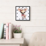 Horloge Carrée Joli renne de Noël<br><div class="desc">Une horloge avec l'illustration d'un adorable cerf de bébé. Grands yeux grands oreilles avec une grande tête et des petits bois bruns. Portant un gros arc rouge.</div>